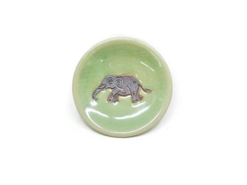 Tiny Celadon dish - brown elephant