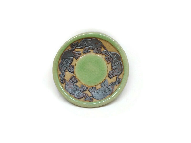 Tiny Celadon dish - brown elephant around the dish