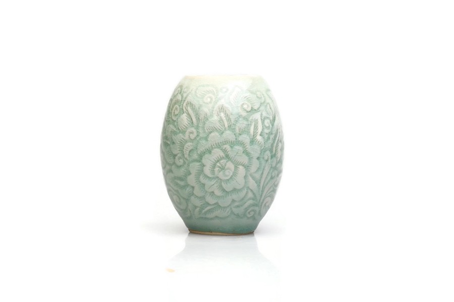 Small Celadon vase with flower carving