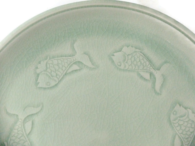 Celadon serving plate with Fish carving